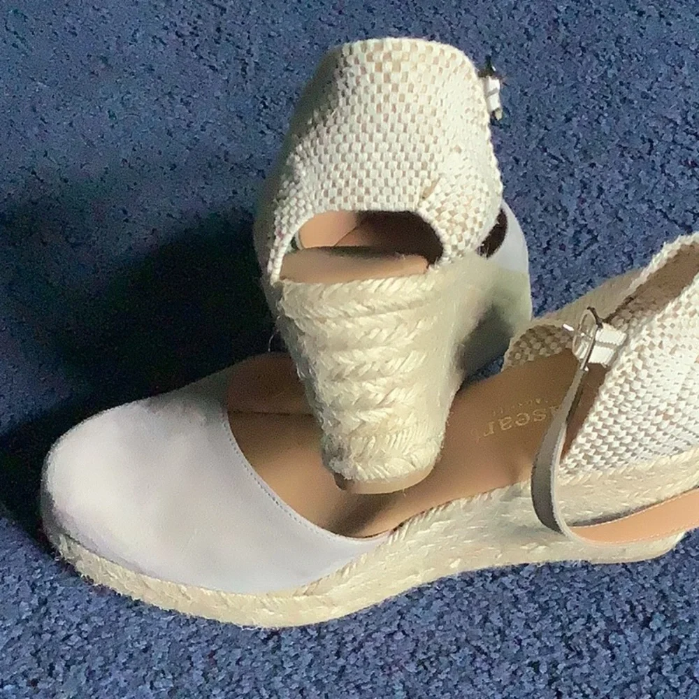 Women’s size 8.5 wedges with ankle strap.